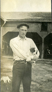 Lou Frink in front of Windham Barns